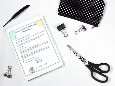 Coho Health Newsletter iPad mockup next to clips and scissors