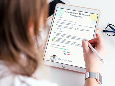 Coho Health Newsletter iPad mockup, with a female reading with iPad with a stylus