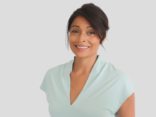 Image of Dee Brereton-Patel wearing a green top